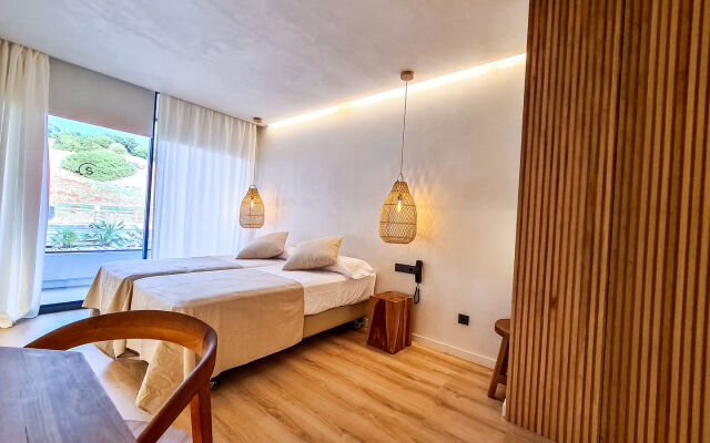 S Estancia Suites