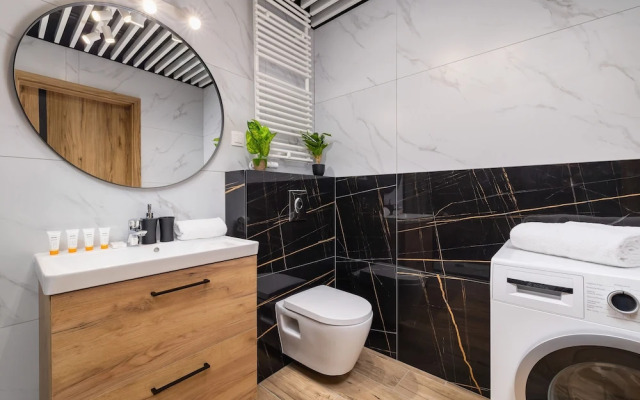 Dark Blue Apartment in Kraków by Renters