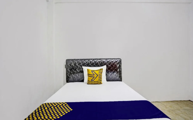 SPOT ON 92452 Griya Sandi Residence Family NearPantai Boom