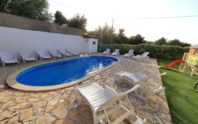Large home with  pool and outdoor kitchen,300 m distant from the sandy beach !