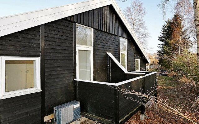 Rustic Holiday Home in Tikøb with Hot Tub & Sauna