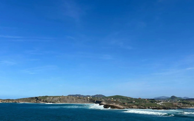 Piso sobre mar junto al Faro de Suances