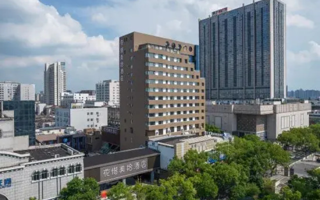 Suzhou Huaxi Meishi Hotel (Heiyi Wujiang Branch)