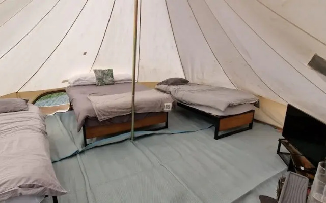 Dog Friendly Cozy Bell Tent With Log Burner