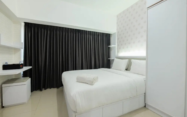 Modern White Studio At Springlake Summarecon Bekasi Apartment By Travelio