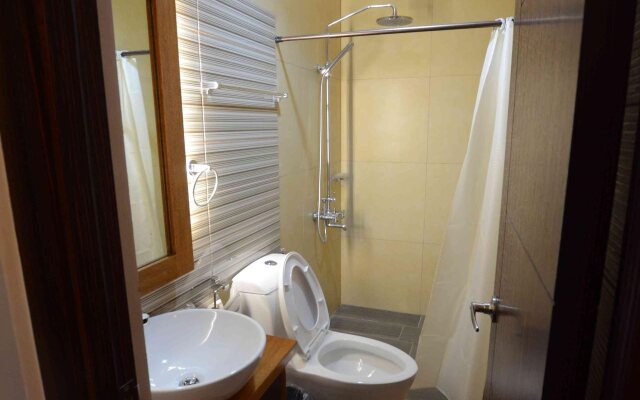 GraceHill EconoSuites Hotel