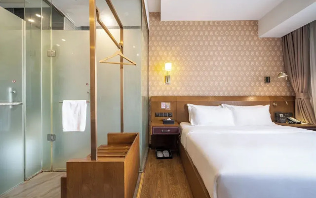 Xingyi Chain Hotel Jiangxia Metro Station