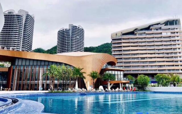 HuiDongXunLlaoWanWuDiHaiJingApartment