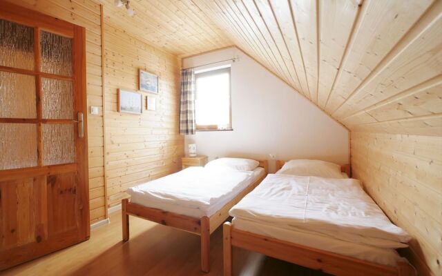 Quaint Holiday Home in Gleznowo With Parasol