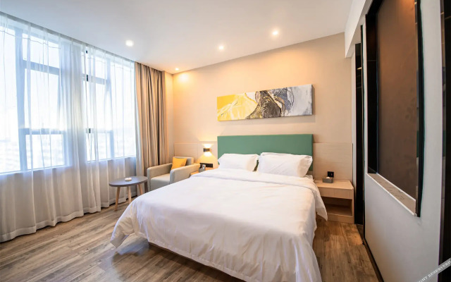 Poltton International Server Apartment(铂顿国际公寓（象州梦幻夜金象路店）)