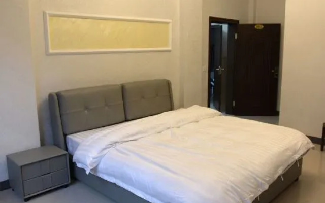 Dongxing Guomen e Homestay