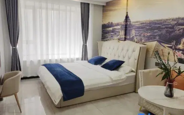 Yuge Hotel (Harbin Qunli Yintai City)