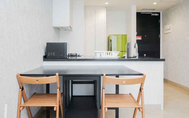 Nice and Comfortable 1BR at Branz BSD Apartment By Travelio – Kitchen – Legok