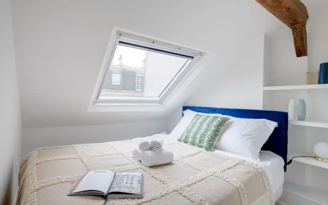 Cozy & Elegant Retreat Near Notre-Dame