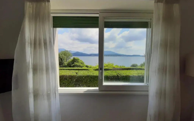 Appartamento GIOIOSA 2 con giardino e vista Lago Maggiore