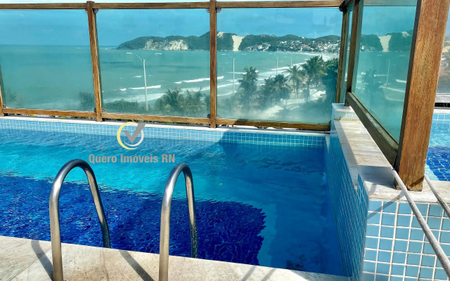 ES - Pé na areia em Ponta Negra