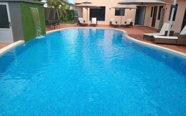 Hibiscus Suites And Residences