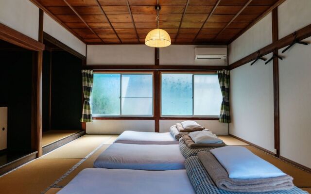 Guesthouse Momonga Village - Hostel