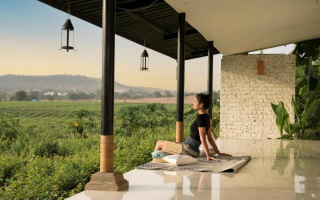 SaffronStays Onellaa, Nashik - infinity pool villa surrounded by a vineyard