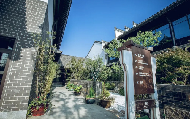 Xinhualian Lv Xin Gu Hotel