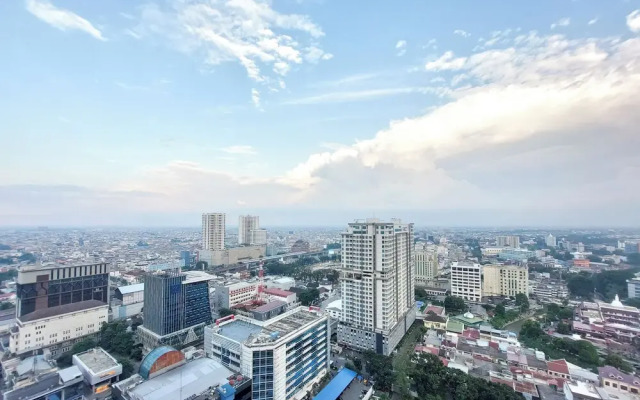 Restful and Comfy Studio Podomoro City Deli Medan Apartment