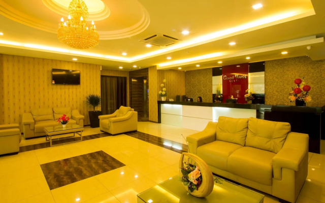 Capital O 91074 Grand World Hotel