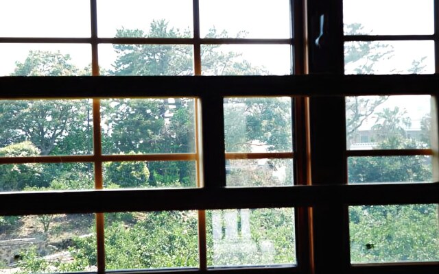 Seogwipo Log House Pension