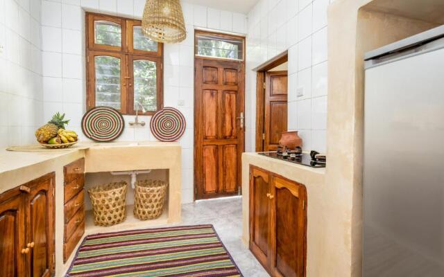 KIMA Serviced Beach House & Suites