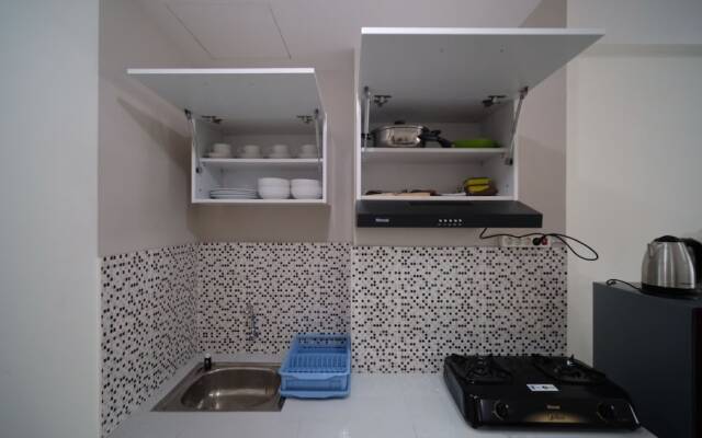 Cozy Living And Tidy 2Br At Puncak Dharmahusada Apartment