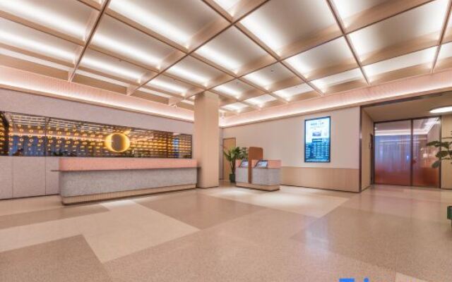 Orange Qingdao North Railway Station Hotel