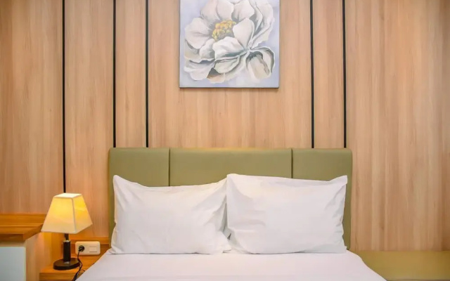 Nice And Cozy Studio At Evenciio Apartment