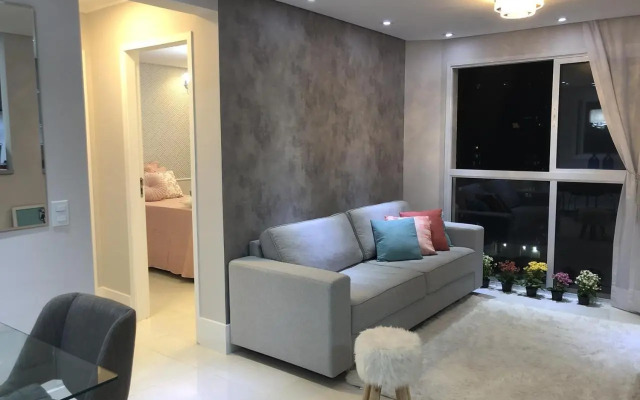 Apto novo, 2 quartos, quadra praia em Santos.