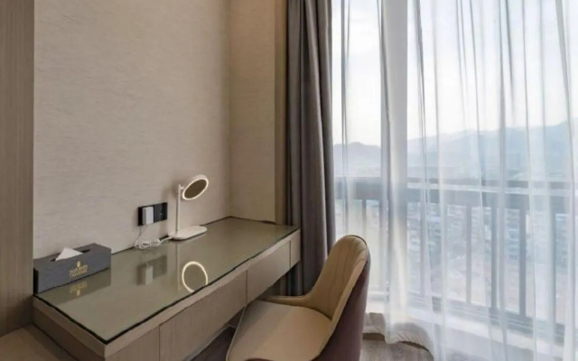 Rezen Hotel Wansheng International