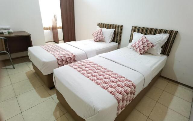 OYO 90075 Feliz Hotel