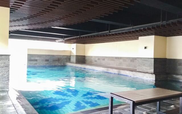 Trendy & Comfy Studio at Tamansari La Grande Apartment
