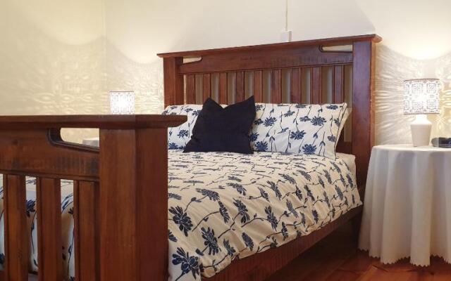 Blue Seas - Beach Front Living