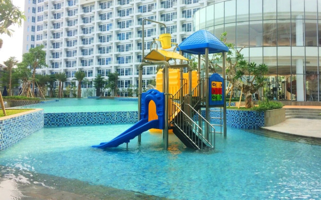 Homey and Modern 2BR Puri Mansion Apartment