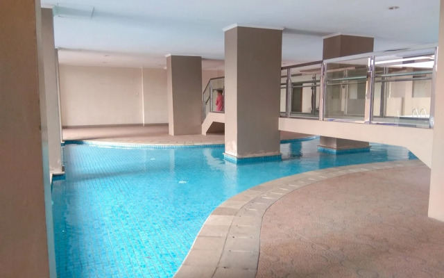 Minimalist 2BR Apartment at Green Park View