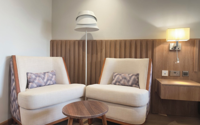 Urbanwoods Hotel Suites by icon
