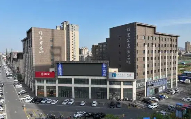 Longkou Jinli Serviced Apartment Hotel (Longhu Tianjie Poly Plaza)