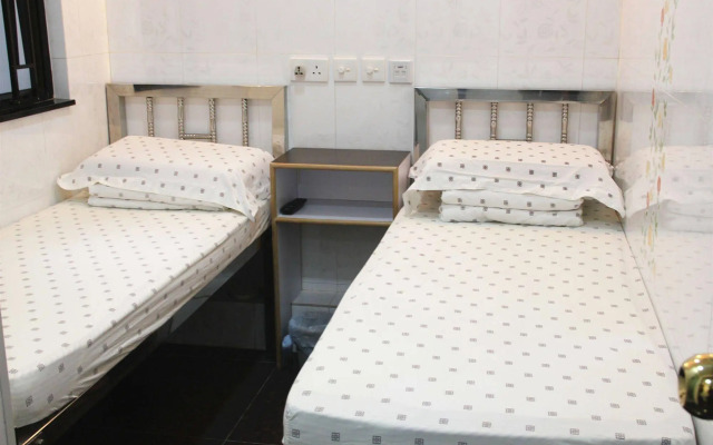 Pay-Less Guesthouse (7/F A9)