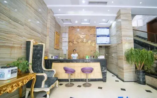 Yi Long Hua Chen Impress Business Hotel