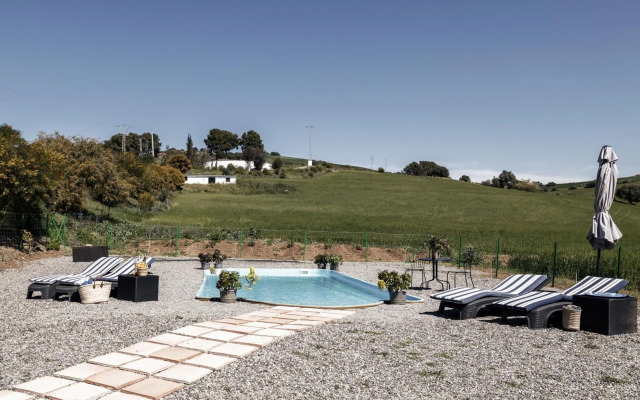 Casa Grande / Rosas Cantares