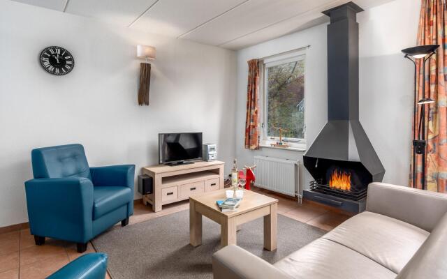 Nice holiday home with fireplace near the Drents-Friese Wold