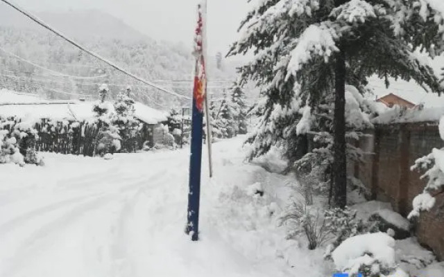 Xuexiang Jinlong Family Hotel