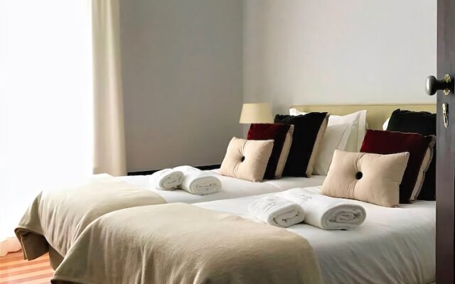 Oryza Guest House & Suites