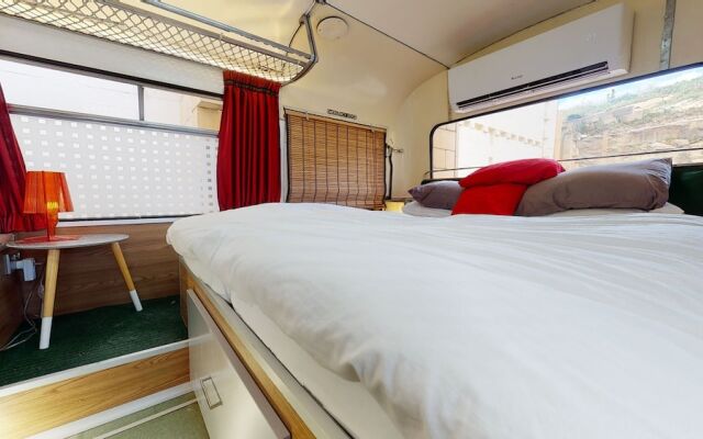 Gozo Bus Glamping - Stay on a 1974 Vintage Maltese bus in Xlendi