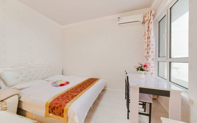 Xinghai Haiyue Bay Suites Apartment