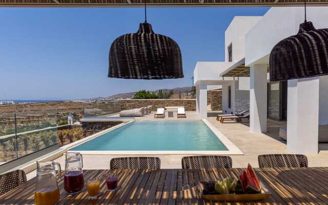 Monogram Travel Tinos
