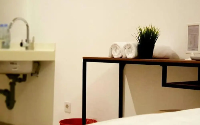 Alpine Room at TreePark City Apartement